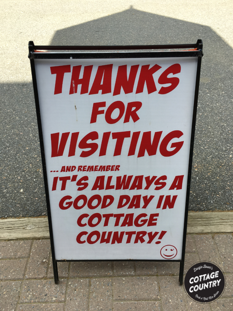 Sign that says: Thanks for visiting...and remember its always a good day at Cottage Country with happy face icon.