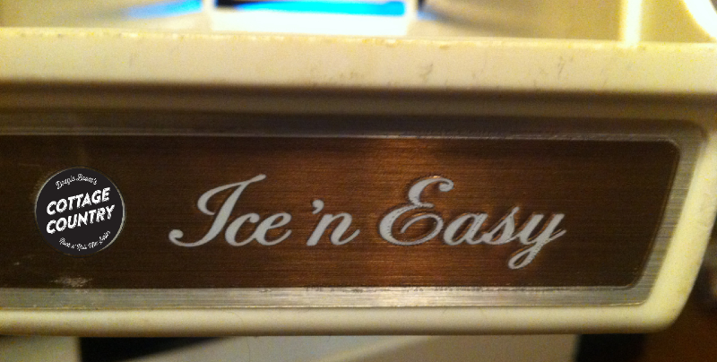 An old refrigerator ice tray that says: Ice 'n Easy in cursive font