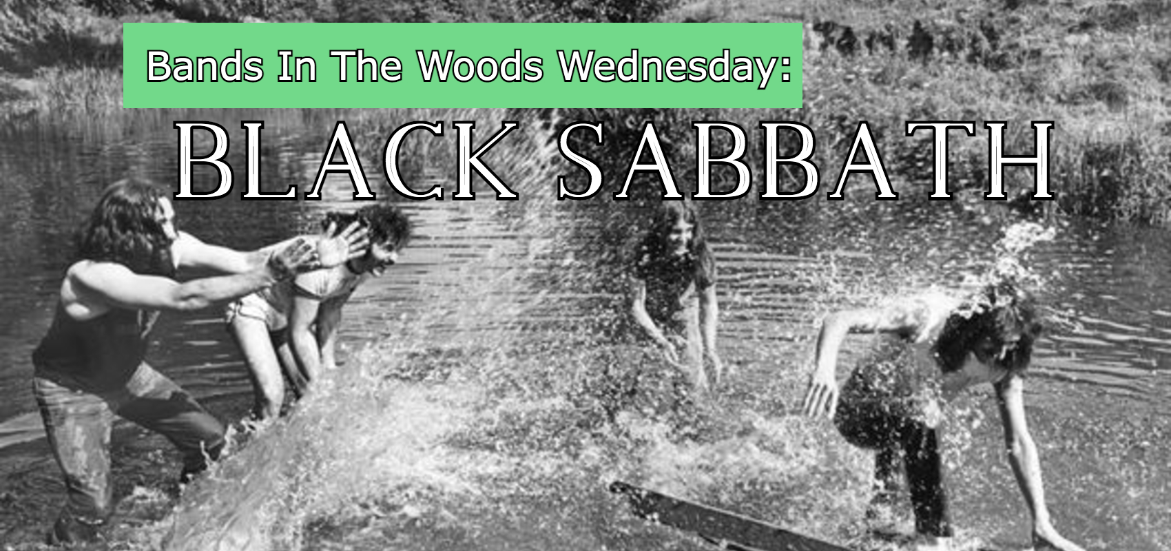 The members of Black Sabbath play in a shallow pond, splashing each other