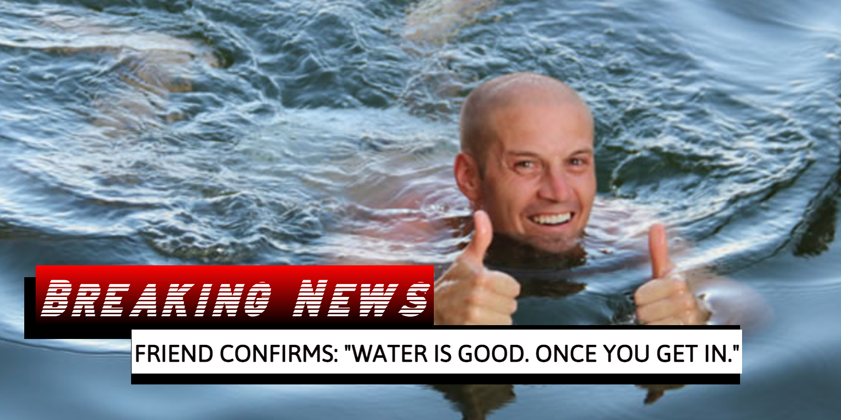 Man swims with thumbs up